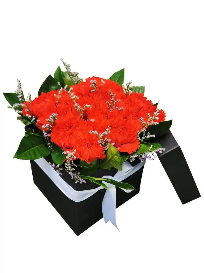 “Red Carnation Bouquet hand-arranged for same-day delivery in Laguna”